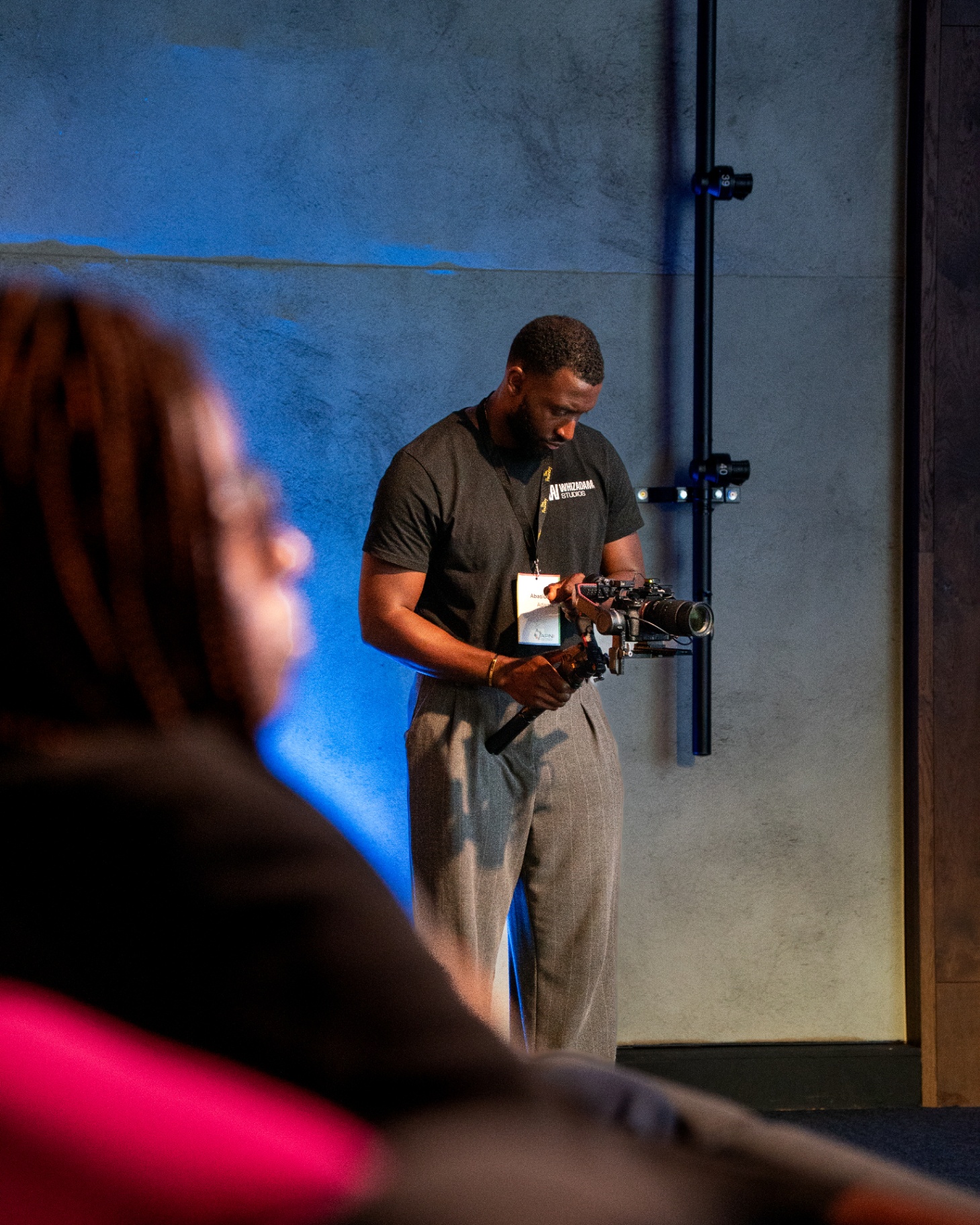 Camera operator filming on set